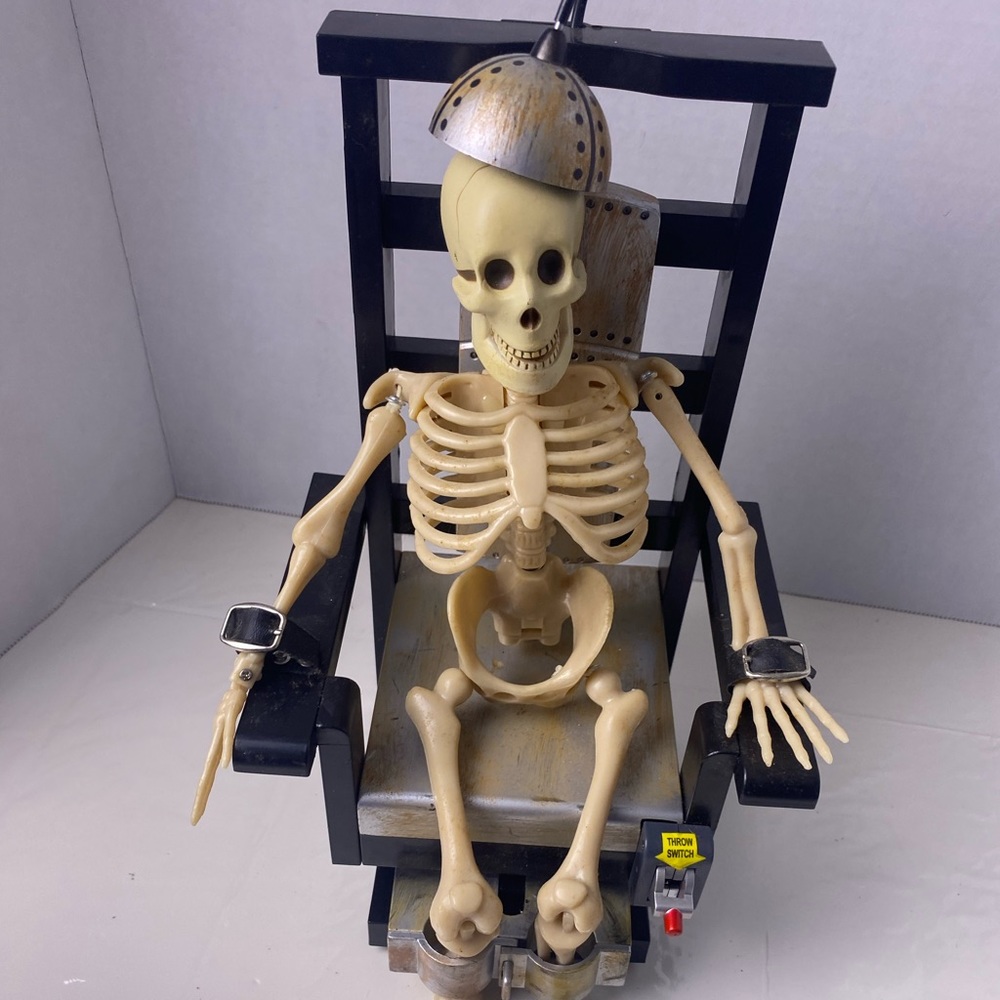 Halloween prop GEMMY JOLTIN JACK. ANIMATED SKELETON IN ELECTRIC CHAIR.